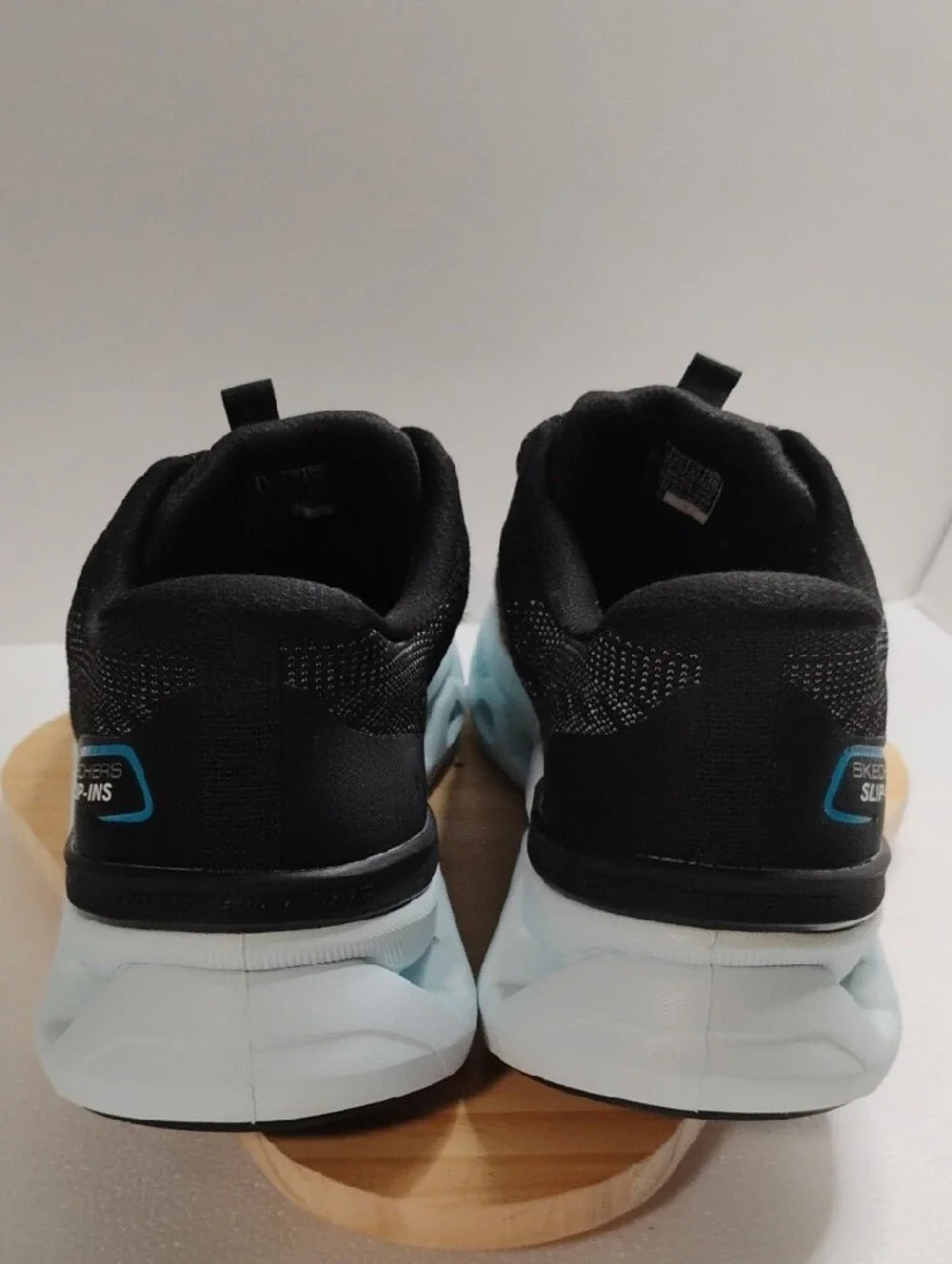 Skechers Men's Black Sneakers with Light Blue Accents